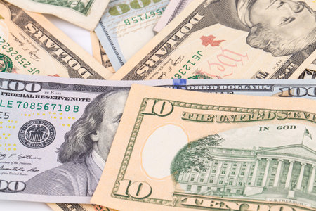 Close up of different dollar bills. Isolated as a background.