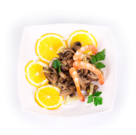 Shrimp salad with mushrooms as haute cuisine. Isolated on a white .の写真素材