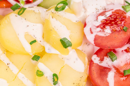 Warm meat salad with vegetables. Whole background.の写真素材