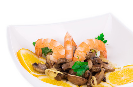 Shrimp salad with mushrooms close up. Whole background.の写真素材