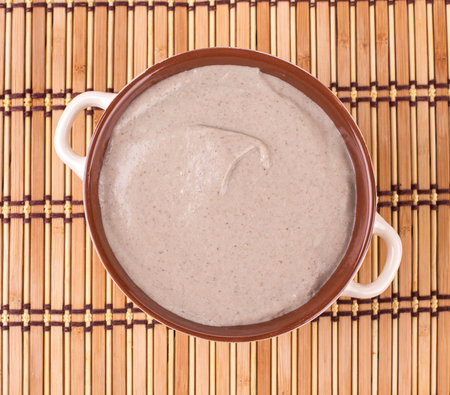 Top of creamy mushroom soup. Whole background.