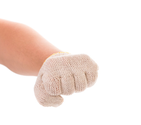 Strong male worker hand glove clenching fistの写真素材