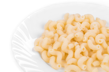 Cooked italian pasta. Close up on the white background.の写真素材