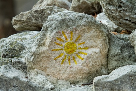 Mountain rocks with design sunの写真素材