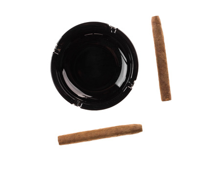 Black ashtray and cigars. Isolated on a white background.の写真素材