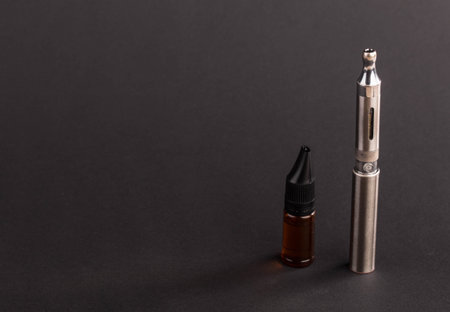Big advanced electronic cigarette. Located on a black background.