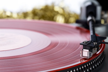 Analog music player with christmas decoration closeupの写真素材