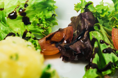 Mashed potatoes with lettuce and tomatoes. As a whole background.の写真素材