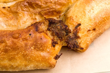 Closeup of cake with cheese and herbs. Can be used as a whole background.の写真素材