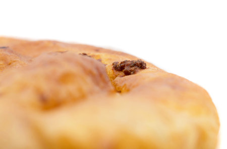 Closeup of delicious puff cake with soft cheese. Macro. Can be used as a whole background.