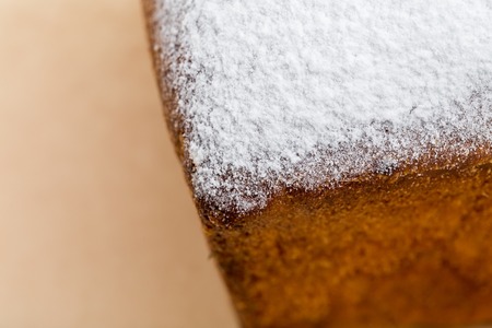 Closeup of delicious cake with sugar powder. Macro. Can be used as a whole background.の写真素材
