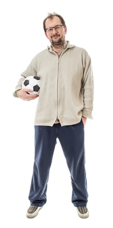 Man in indoor clothing holding soccer ball. Isolated on a white background.の写真素材