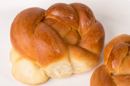 Two fresh delicious buns. Macro. Photo can be used as a whole background.