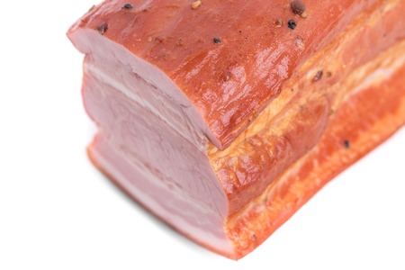 Delicious smoked pork belly. Isolated on a white background.の写真素材