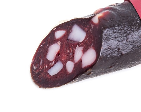 Delicious horse meat salami stick. Macro. Isolated on a white background.の写真素材
