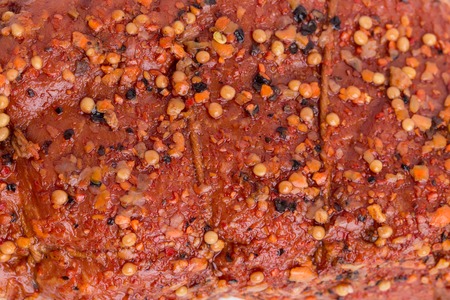 Delicious smoked pork ham with spices. Macro. Photo can be used as a whole background.の写真素材