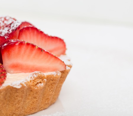 Delicious strawberry shortcake with whipped cream. Macro. Photo can be used as a whole background.の写真素材
