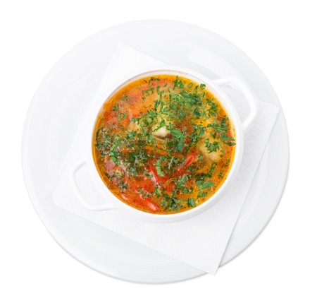 Fish soup with salmon and vegetables. Isolated on a white background.の写真素材
