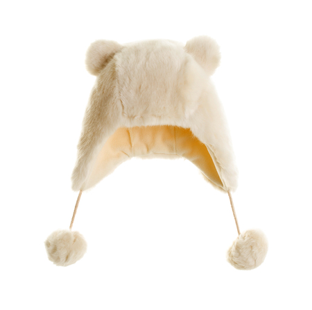 White fur cap with pompons and ears. Front side. Isolated on a white background.の写真素材