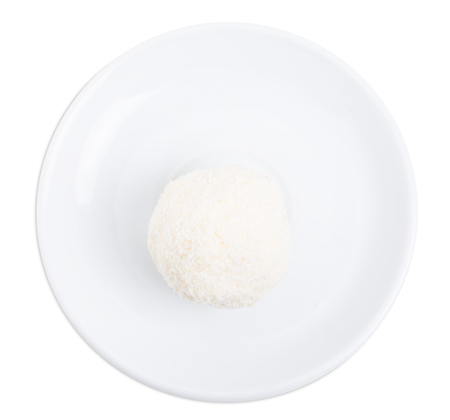 Delicious almond and coconut candy. Isolated on a white background.の写真素材