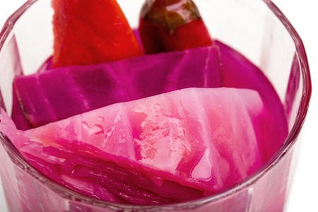 Traditional marinated vegetables in glass. Macro. Photo can be used as a whole background.の写真素材