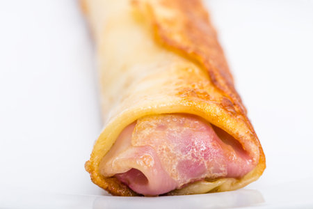 Russian pancake stuffed with cherry jam. Macro. Photo can be used as a whole background.
