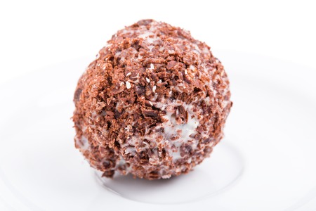 Delicious candy with prune and chocolate. Macro. Photo can be used as a whole background.の写真素材