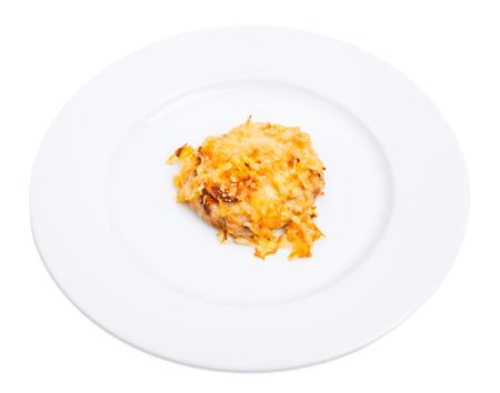 Chicken rissole covered with cheese. Isolated on a white background.の写真素材