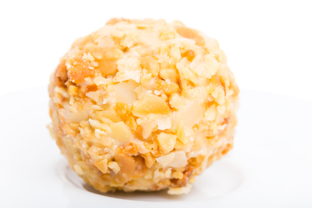 White chocolate candy with crumbled biscuit. Macro. Photo can be used as a whole background.の写真素材
