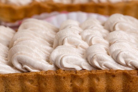 Delicious meringue cake. Macro. Photo can be used as a whole background.の写真素材