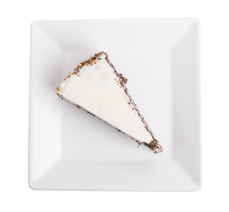 Delicious poppy seed cake with walnuts. Isolated on a white background.の写真素材