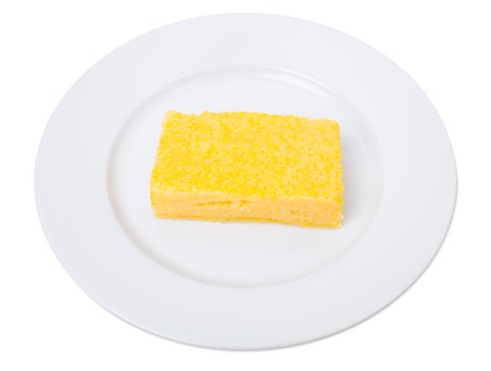 Traditional maize polenta. Isolated on a white background.の写真素材
