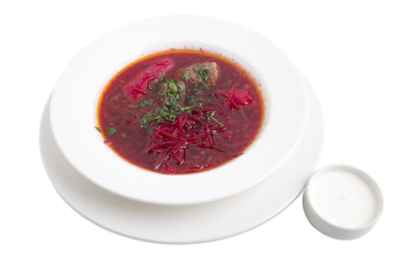 Traditional Ukrainian borscht with meat. Isolated on a white background.の写真素材