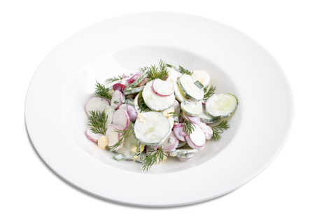Radish salad with sour cream. Isolated on a white background.の写真素材