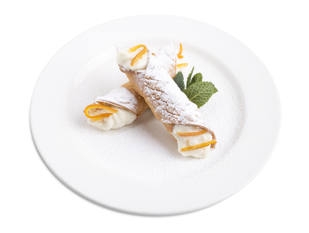 Sicilian cannoli with ricotta. Isolated on a white background.の写真素材