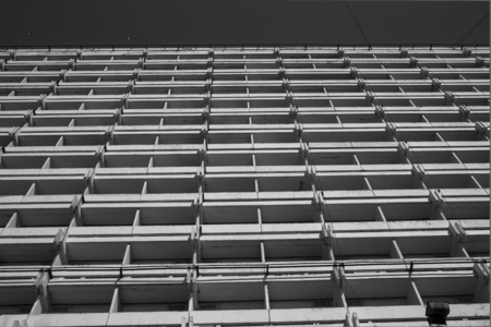 Bottom view of the high building. Black and white photo.の写真素材