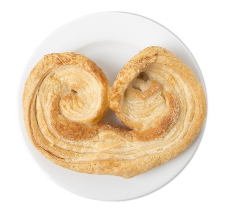 Crunchy puff pastry. Isolated on a white background.の写真素材