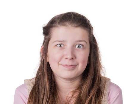 Portrait of a beautiful girl. Isolated on a white backgroundの写真素材