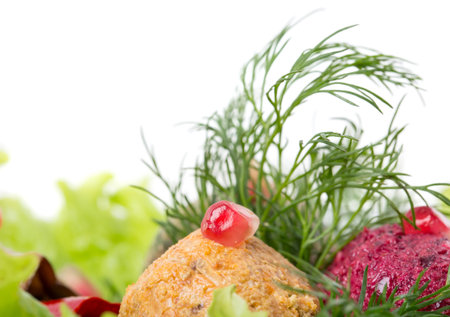 Delicious georgian appetizer phali from spinach and walnuts. Macro. Photo can be used as a whole...