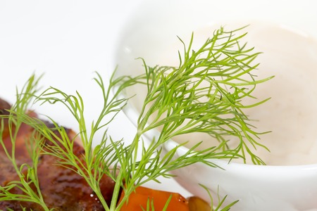 Fresh dill on pork fillets. Macro. Photo can be used as a whole background.の写真素材