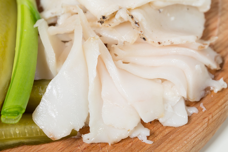 Assorted pork fat with pickles. Macro. Photo can be used as a whole background.の写真素材