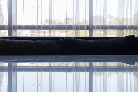 Effect of a reflection in a design. A window and its reflection as a background.の写真素材