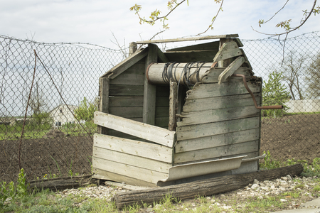Old graw well. It located near a main road. Close-up.の写真素材