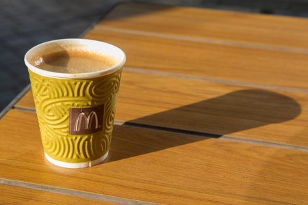 Coffee is located on a wooden surface September 14 2018 in Chisinau. Close-up.