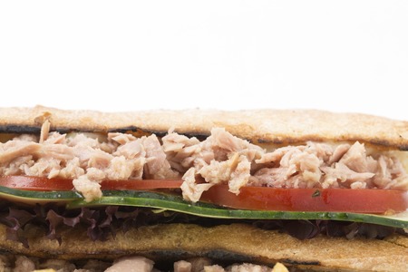 Fragment of club sandwich with canned tina. Close-up.の写真素材