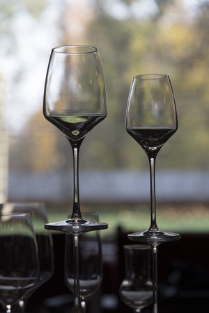 The row of wine glasses on a sill.の写真素材