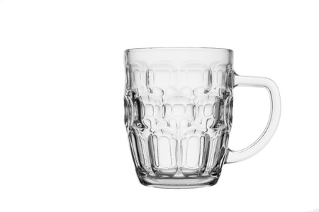 Empty beer glass. Isolated in a white background. Close-up.の写真素材