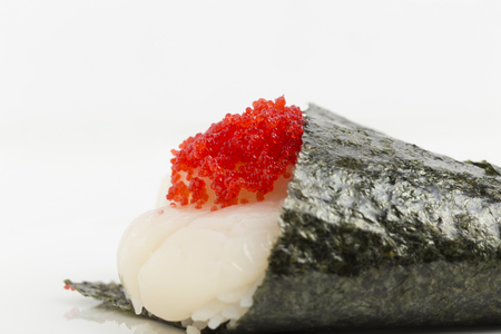 Temaki with fresh scallop and red caviar. Close-up.の写真素材