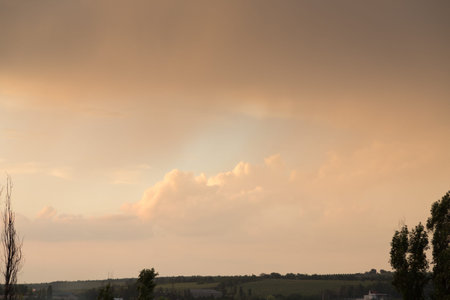 Orange clouds are at the sunset time. This image may be used as a background.