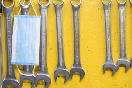 A set of tools in a workshop during an epedemic. Close-up.